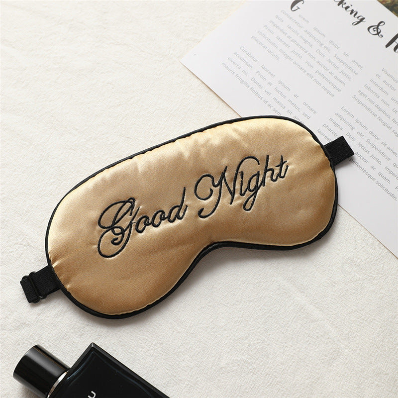 Masque de nuit en soie brodée avec aération réglable